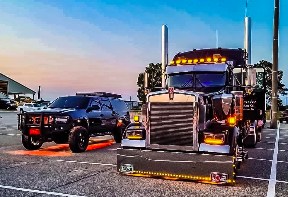 Big Rig and Truck Lit Up at Sunset
