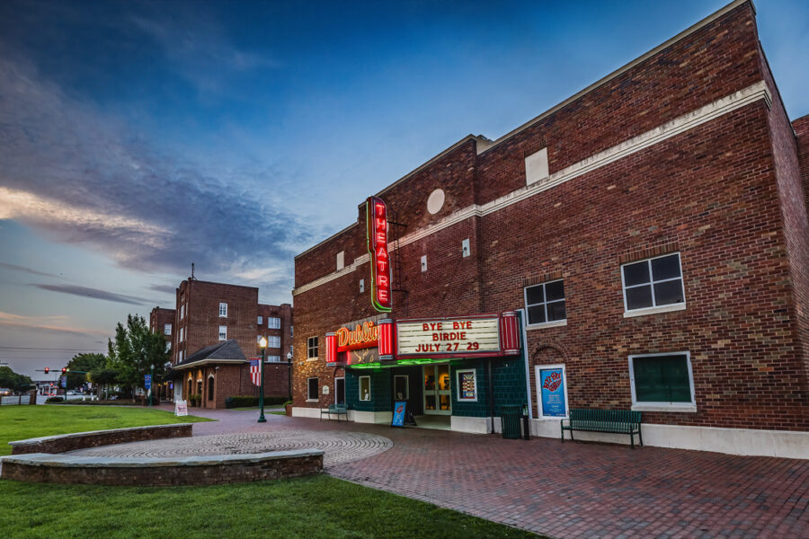 outside shot of Theatre Dublin at dusk, and the lush green space in front of the building. Elvis once visited this theatre.