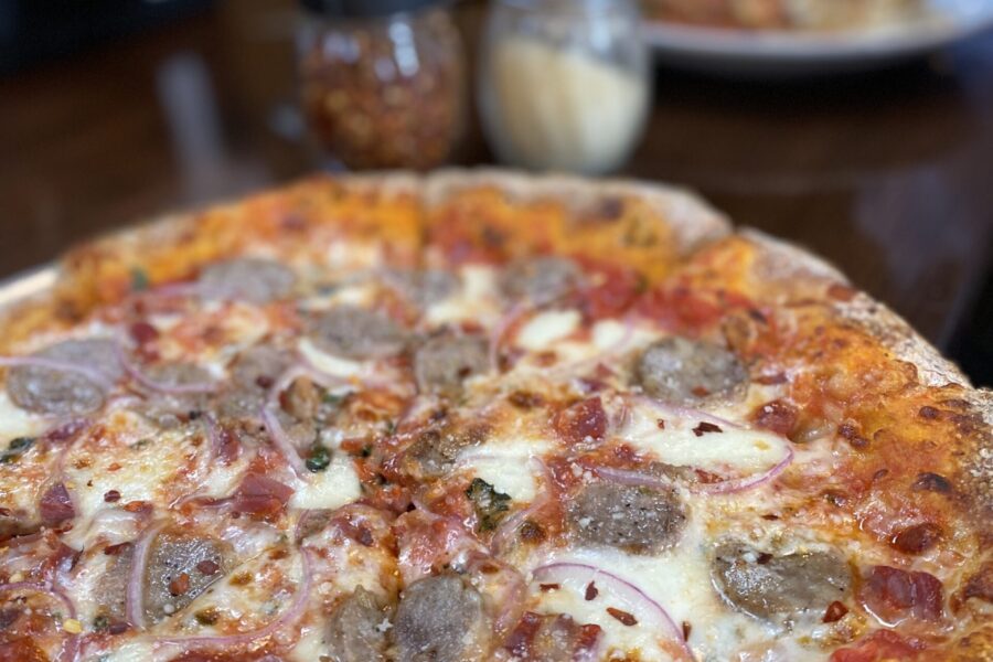 Cheesy delicous pizza pictures at Deano's Italian.