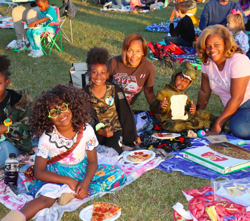 Family waits to watch the Movie on the Lawn at Fairview Park|Saturday October 22