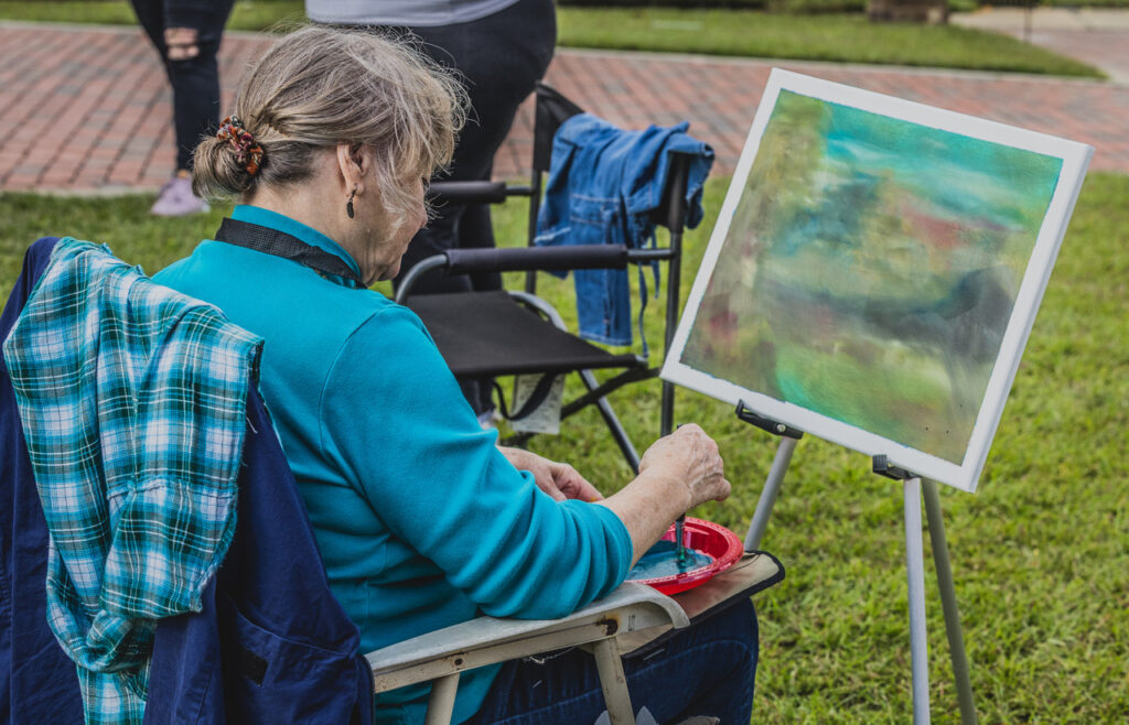 Art Dublin artist painting a scene