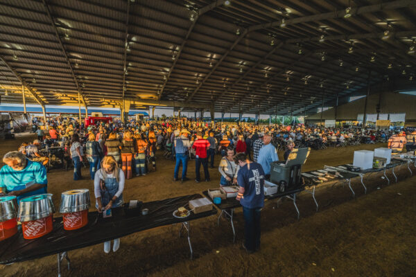 crowd gathered for oyster and pig roast