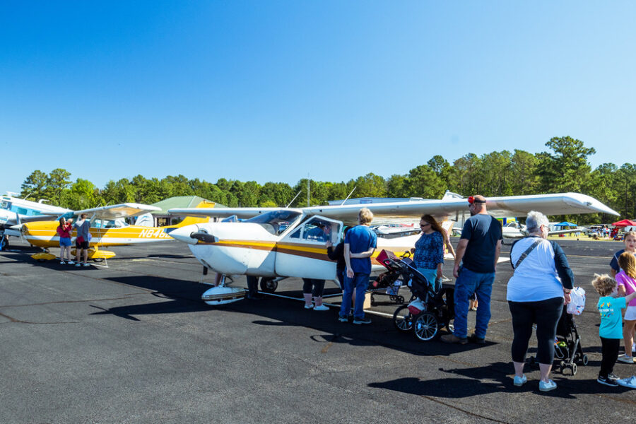 spectators looking at airplanes at Wheels and Wings event in Dublin Georgia.