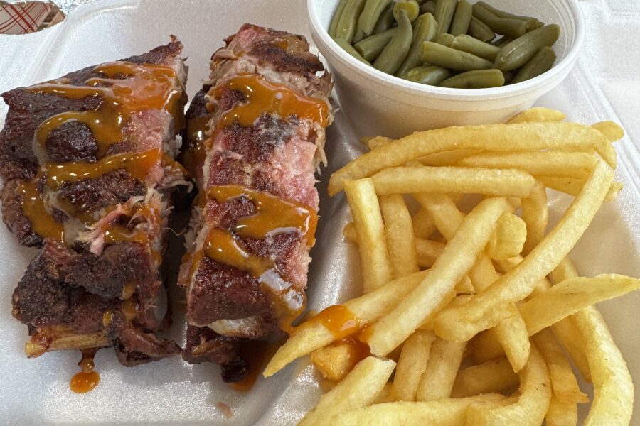Smoked rib plate at Southern Heritage BBQ with green beans and French fries on the side.