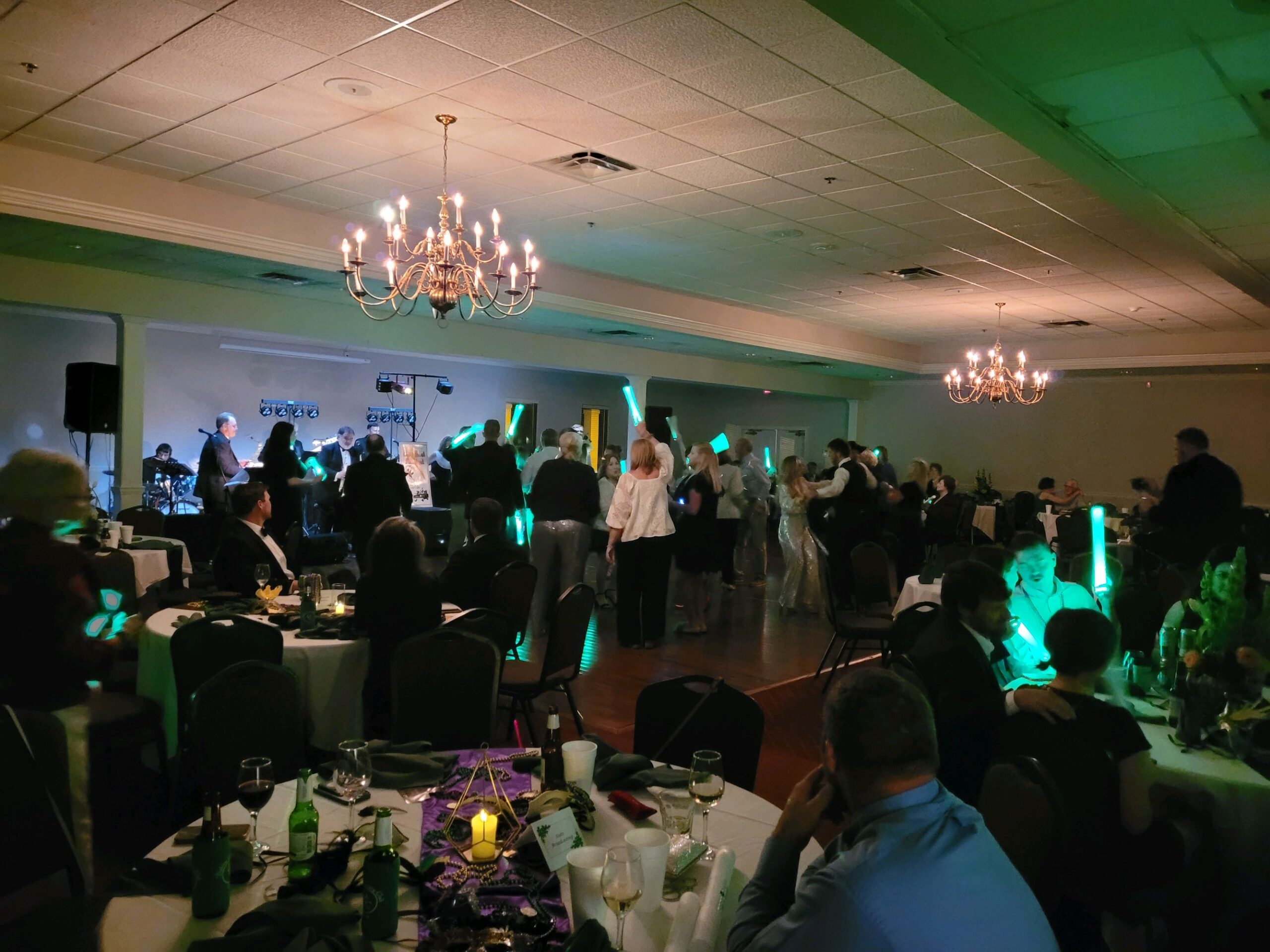 People enjoying live music on the dance floor at St. Patrick's Gala.