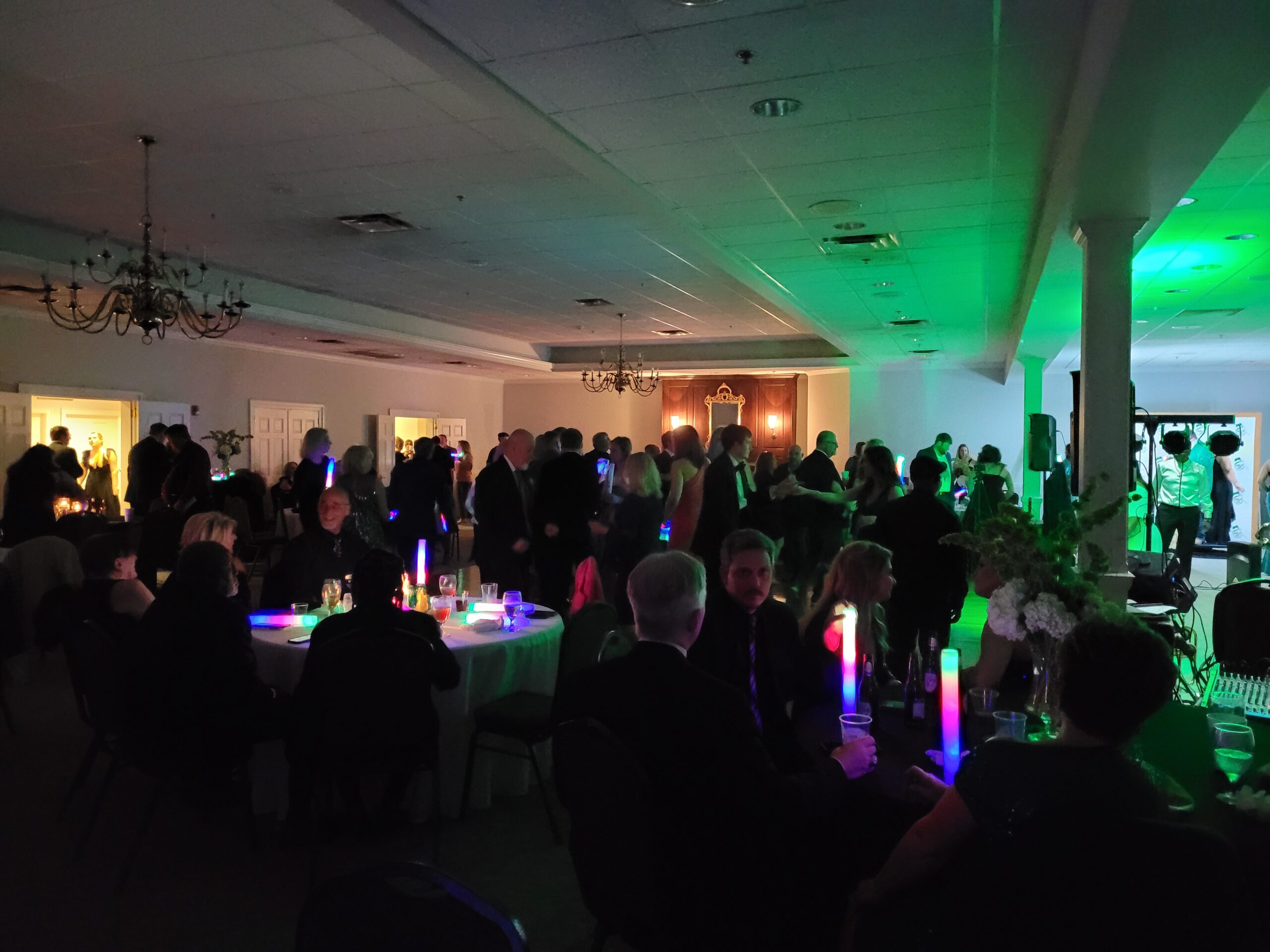 People enjoying live music on the dance floor at St. Patrick's Gala.