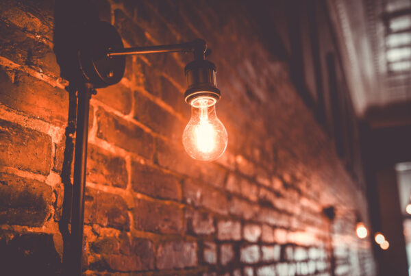 A industrial esthetic lightbulb in Company Supply, one of three restaurants mentioned in the 2024 Savor GA.