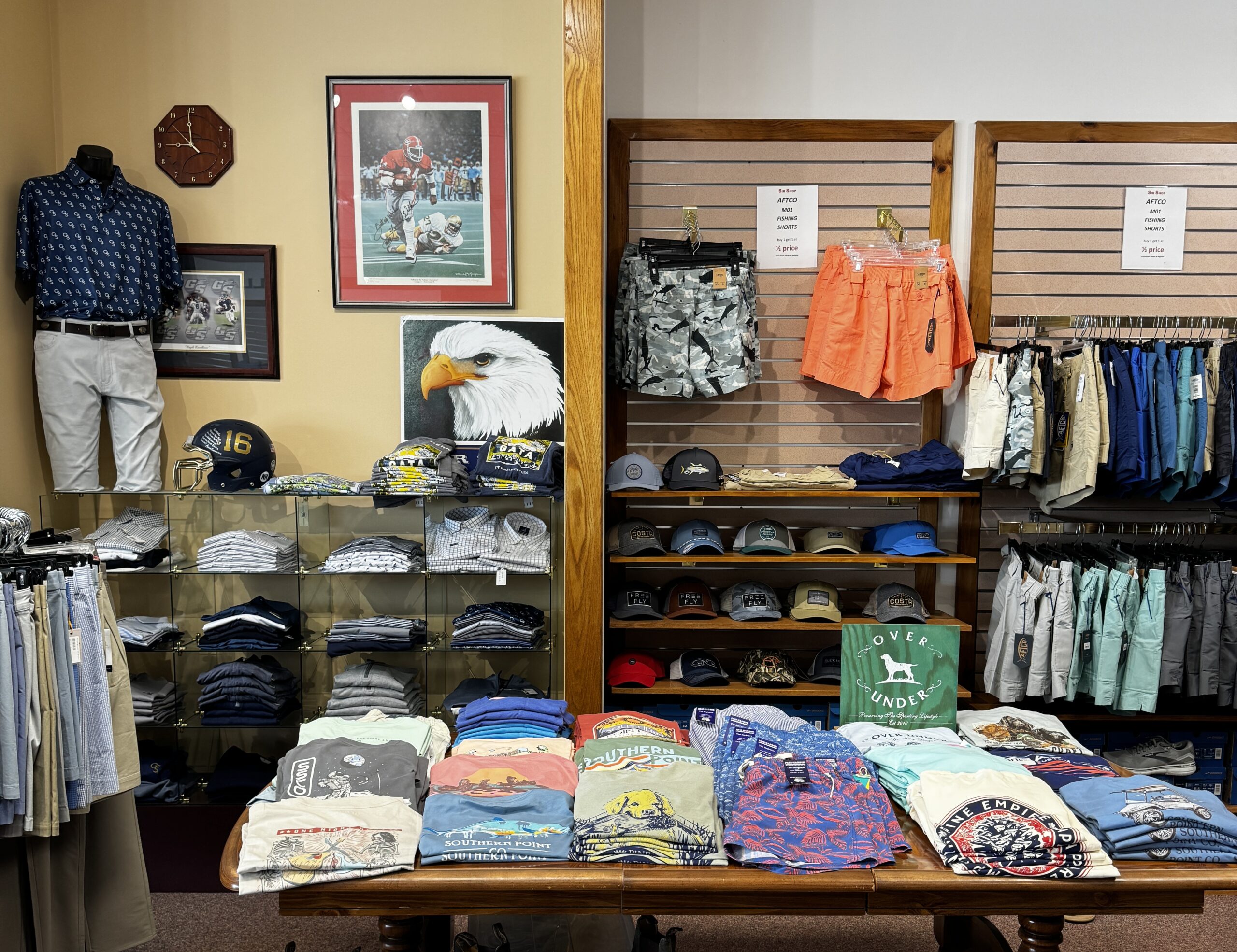 Shelves lined with folded clothes at the Sir Shop