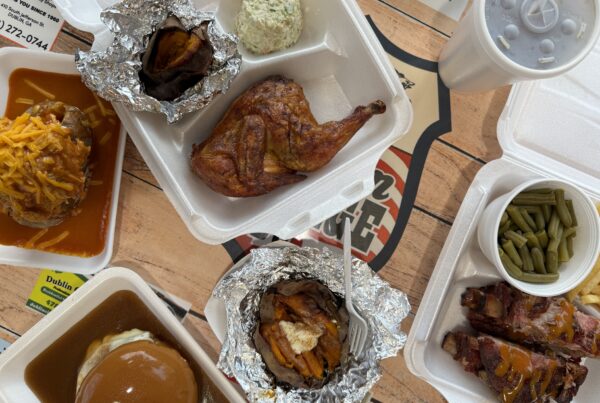 A table full of an assortment of BBQ options from Southern Heritage - Southern BBQ