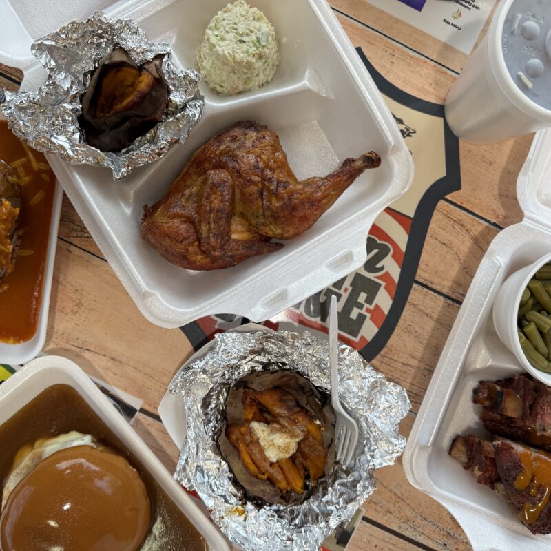 A table full of an assortment of BBQ options from Southern Heritage - Southern BBQ
