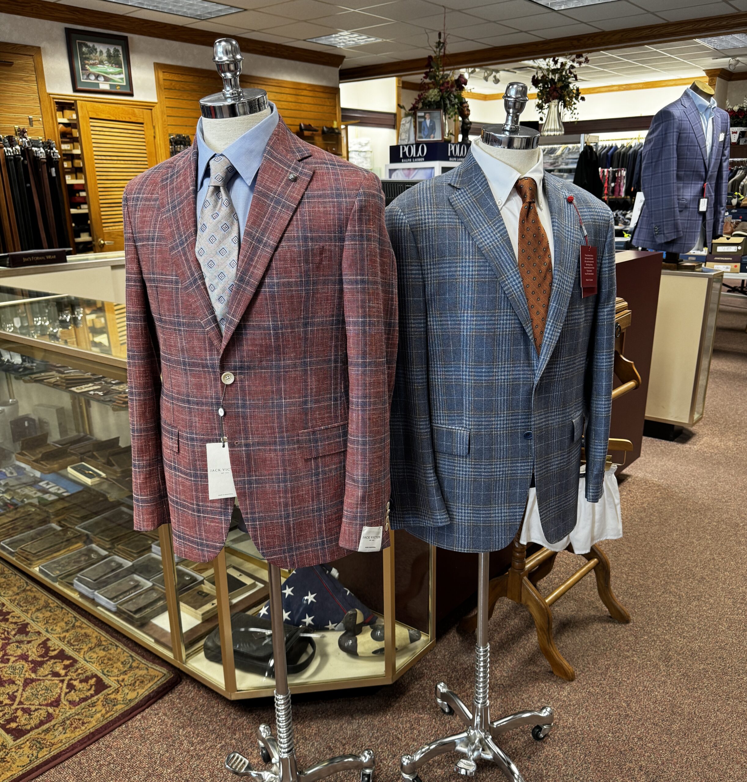 A red and a blue sports jacket displayed at the Sir Shop