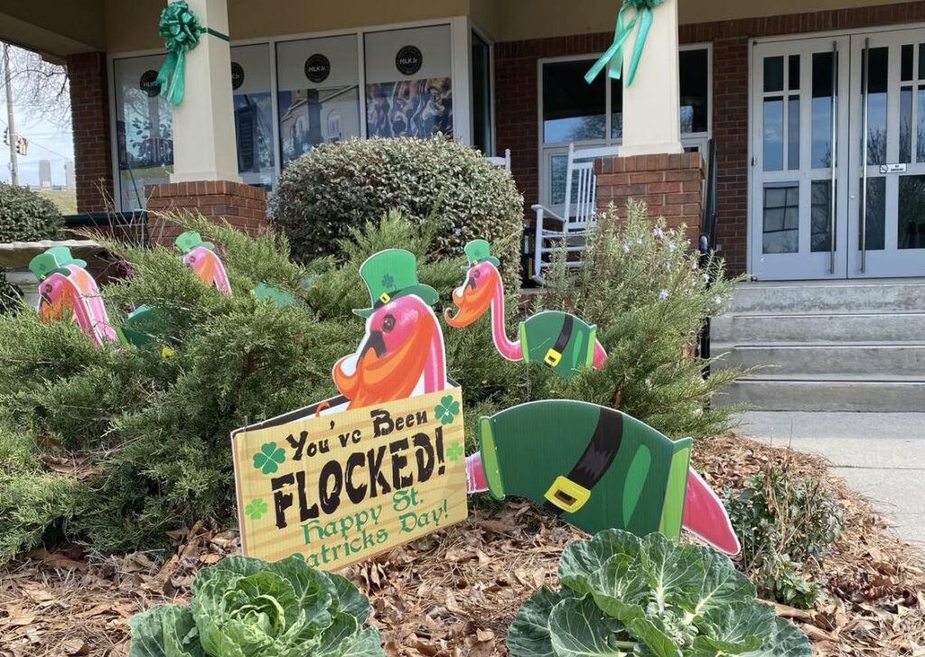 Leprechuan Flamingos and green ribbons decorate the entrance to the Dublin Visitors Center during Green Up for St Patricks