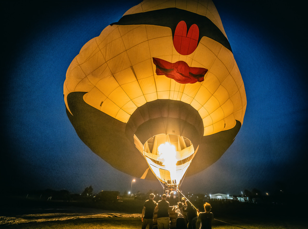 Flame shooting into a hot air balloon during the St. Patrick's Festival Irish balloon Fest.