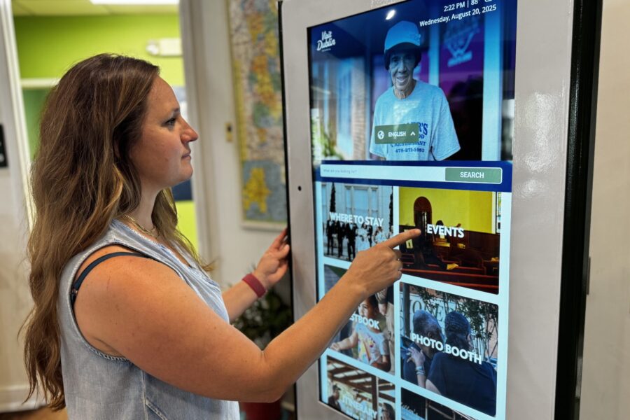 Visit Dublin GA director tests out the new digital kiosk