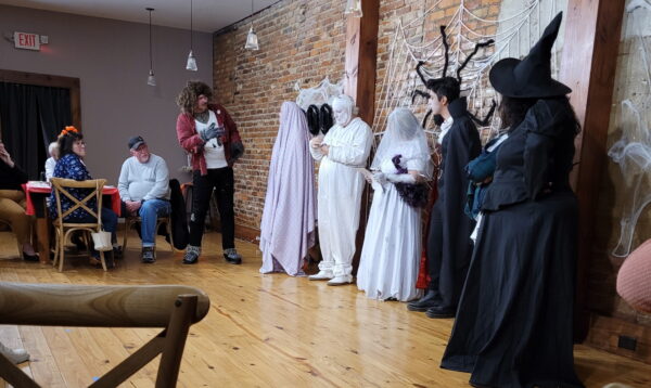 Dublin Main Street Players take the stage as Halloween characters.