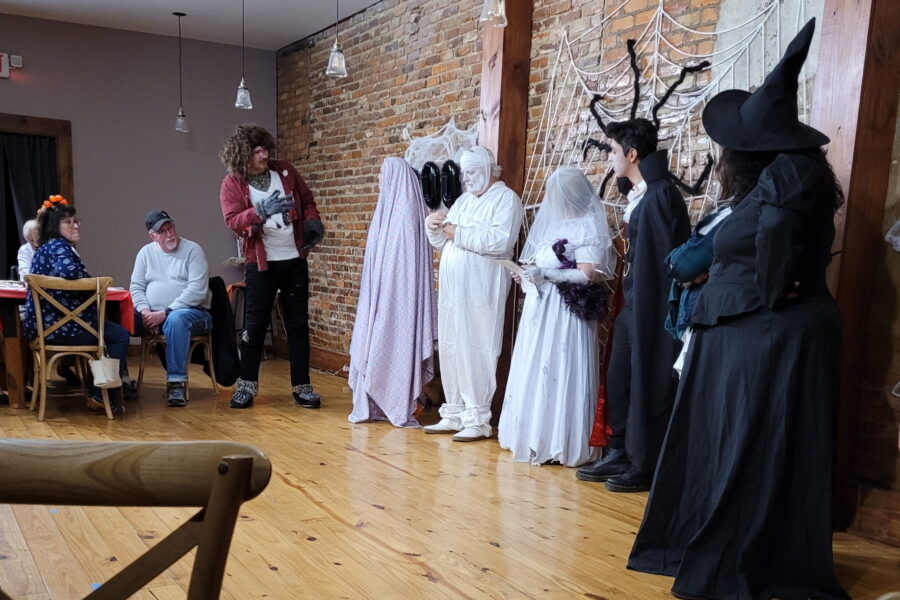 Dublin Main Street Players take the stage as Halloween characters.