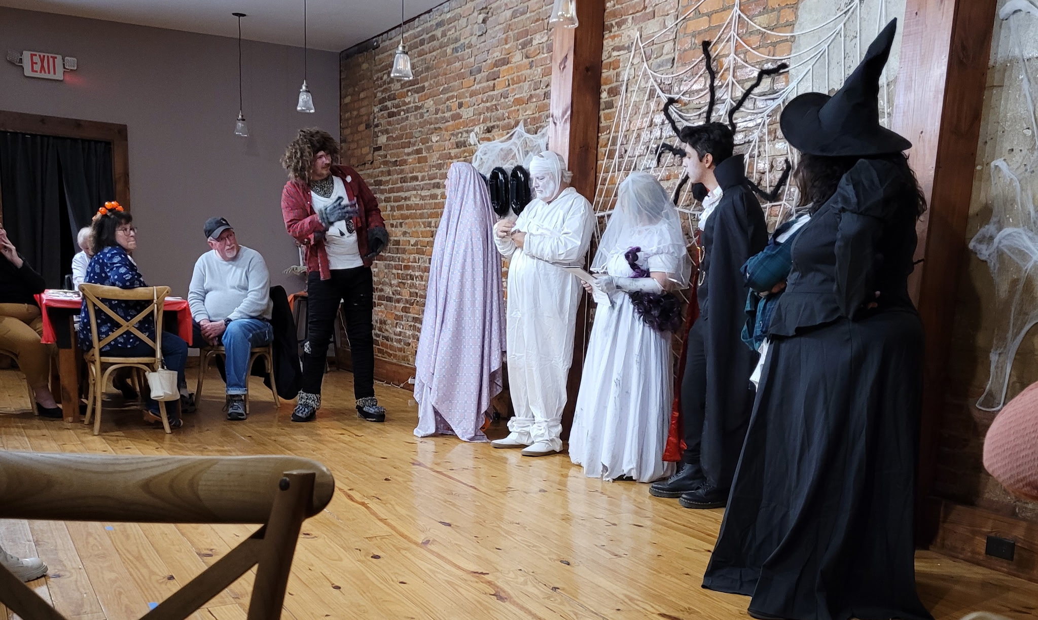 Dublin Main Street Players take the stage as Halloween characters.
