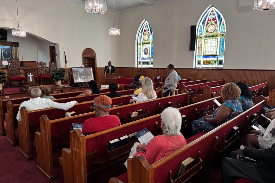 People sit in the pews of the First African Baptist Church during the One Day: Dublin's Civil Rights Experience