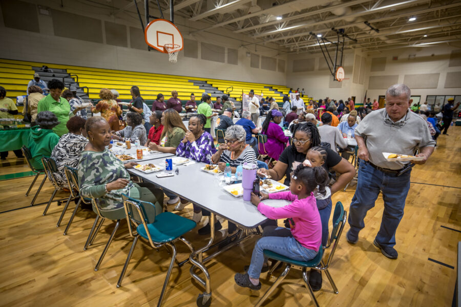 Group of people hanging out and eating at the Soul Food Expo