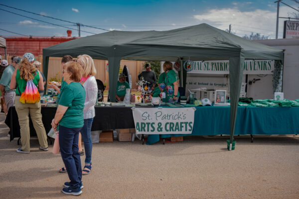 Ladies standing near a booth at Dublin's St. Patrick's Arts & Crafts Festival.