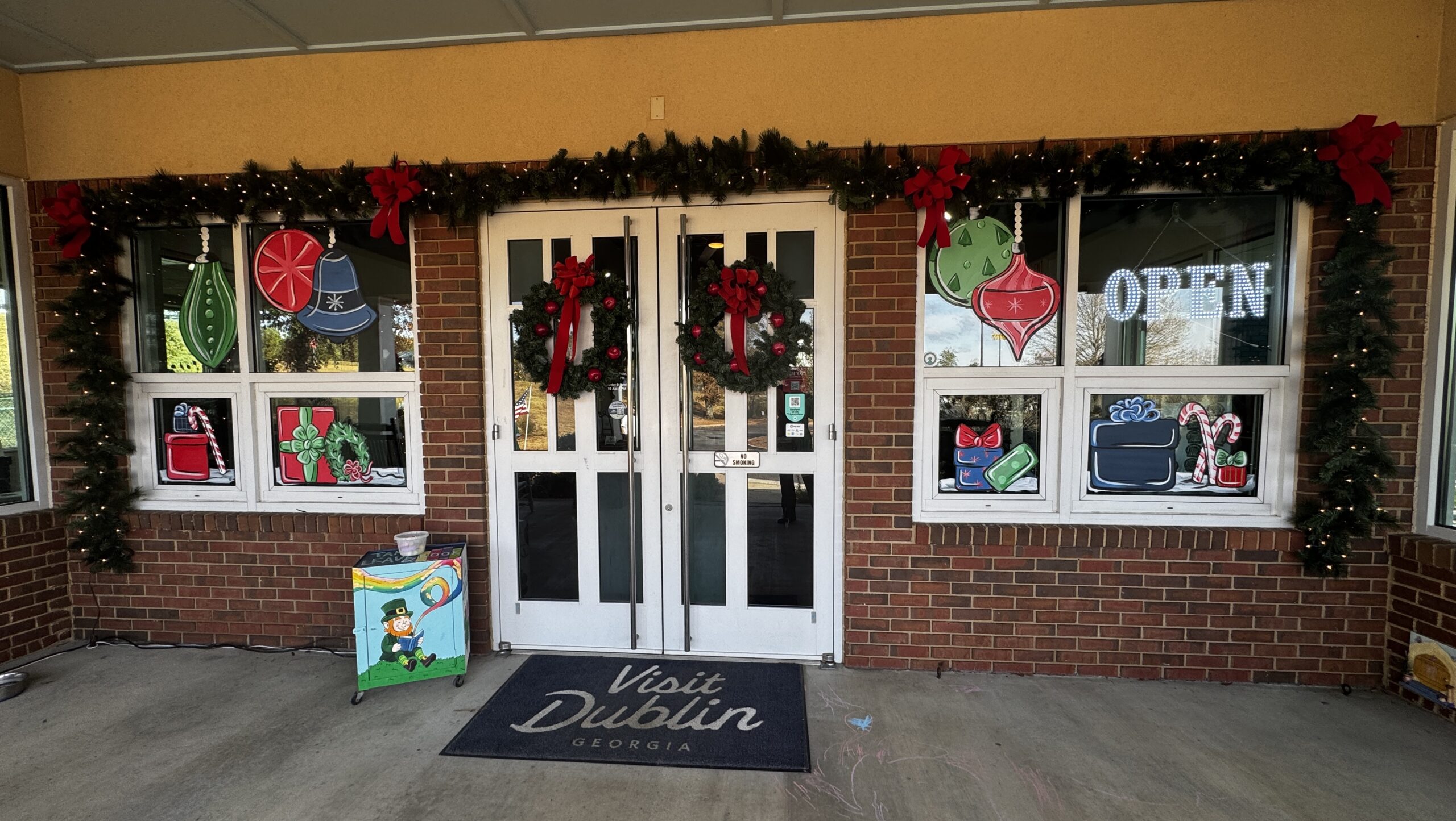 Front door of the Dublin Visitors Center decked out with Christmas decorations for the Holly Jolly Welcome