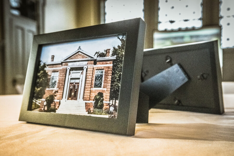 Framed postcard photo of historic Dublin Carnegie serving as table decor during an event.