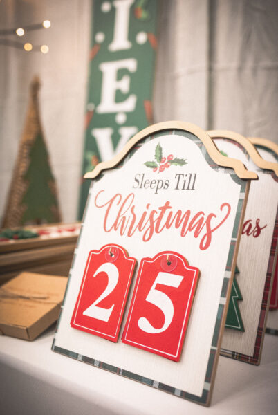 A sign reminder that Christmas is the 25th, which is fitting for this Curate Christmas Market page.