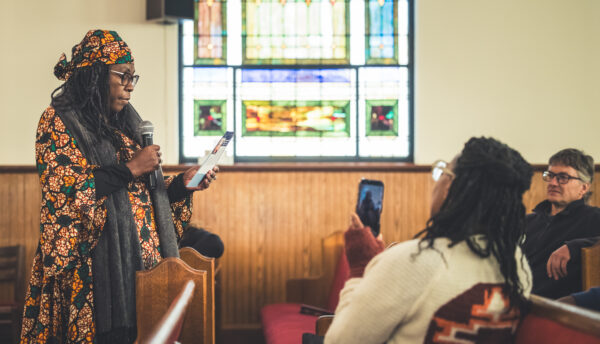 People the pews of the First African Baptist Church participating in the reader's theatre during the One Day: Dublin's Civil Rights Experience.