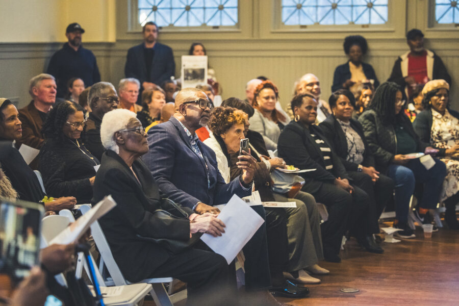 Audience members listening intently to the speaker during a Carnegie Events.