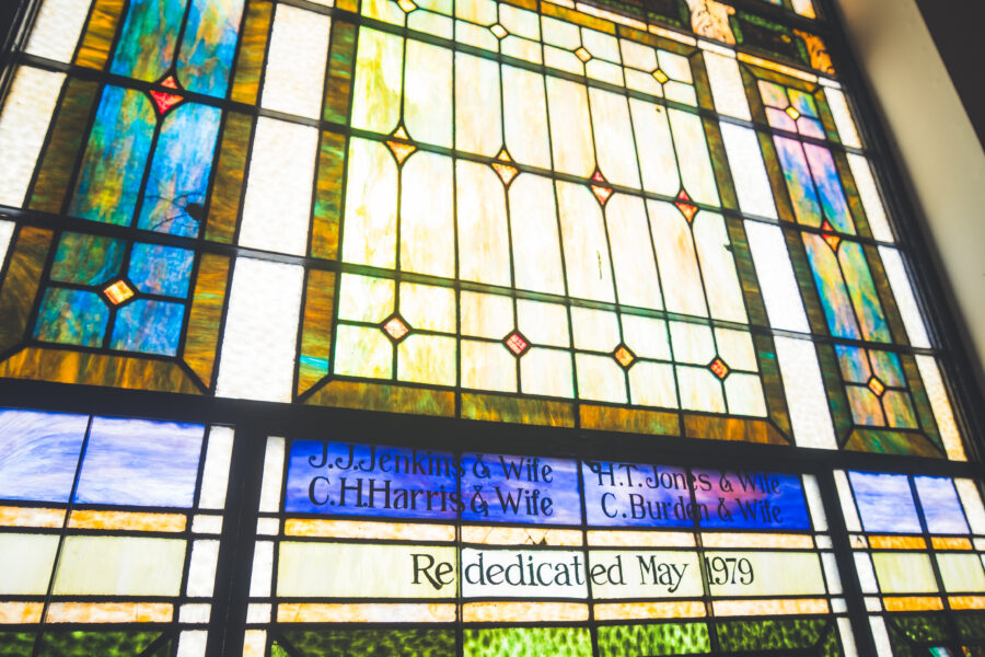 Stained glass window inside the sanctuary of First African Baptist Church where the historic bell celebration will take place.