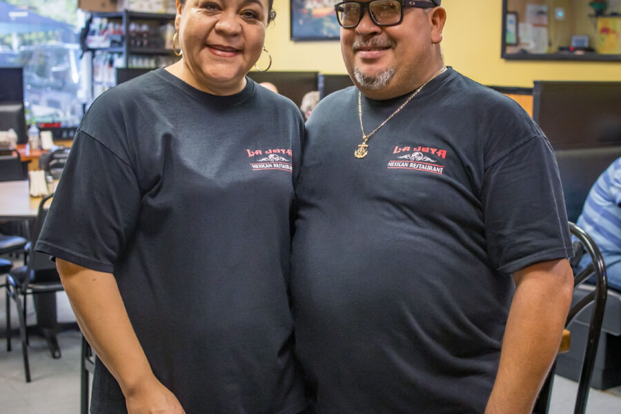 Owners of La Joya Mexican Restaurant, Yadira and Ruben Castro, stand together in their restaurant.