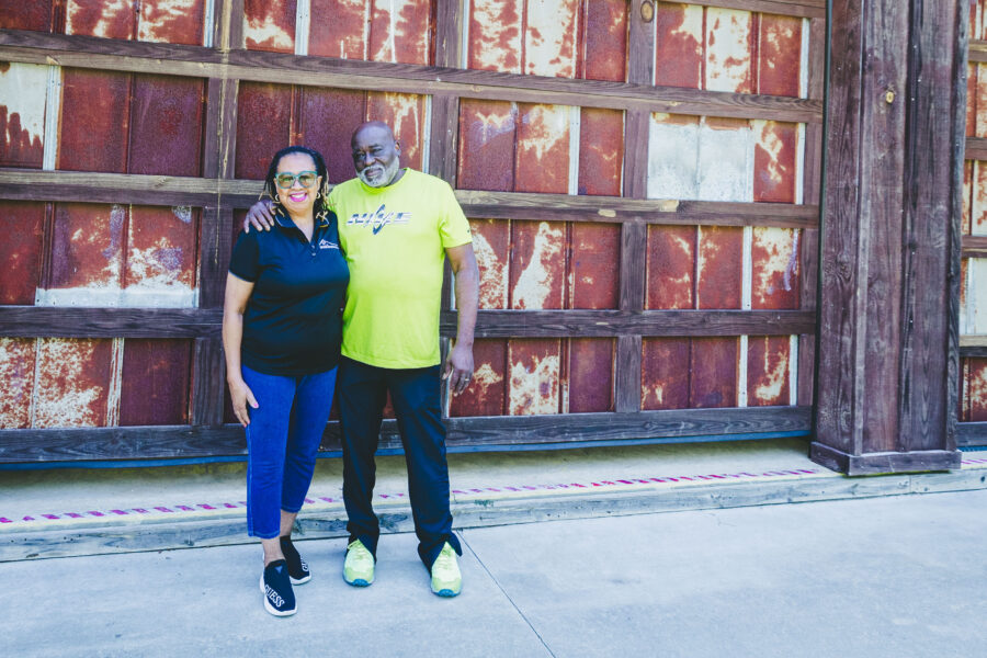Richard and Diane Nesbitt stand outside of Rinesdi Acres.