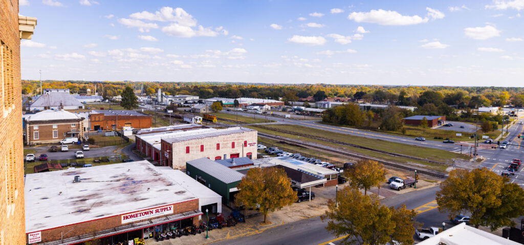 A view from Dublin's tallest building, The Skyscraper, overlooking old buildings in Downtown Dublin and railroad tracks.